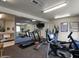 Well-equipped fitness center with treadmills, elliptical machines, and stationary bikes at 535 S Alma School Rd # 113, Mesa, AZ 85210