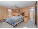 Main bedroom with king bed and built-in cabinets at 535 S Alma School Rd # 113, Mesa, AZ 85210