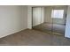 Bedroom featuring mirrored closet doors at 6550 N 47Th Ave # 286, Glendale, AZ 85301