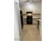 Compact kitchen with essential appliances and ample cabinet space at 6550 N 47Th Ave # 286, Glendale, AZ 85301