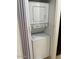 Convenient laundry closet featuring a stacked washer and dryer unit at 6550 N 47Th Ave # 286, Glendale, AZ 85301