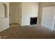 Neutral living room features fireplace and carpeted floors at 6550 N 47Th Ave # 286, Glendale, AZ 85301