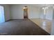 Bright and open living room with carpet and tile flooring at 6550 N 47Th Ave # 286, Glendale, AZ 85301