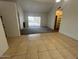 Bright and open living room with carpet and tile flooring at 6550 N 47Th Ave # 286, Glendale, AZ 85301