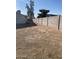 Large backyard with gravel and block wall at 702 W Grove Cir, Mesa, AZ 85210