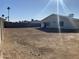 Spacious backyard with view of home at 702 W Grove Cir, Mesa, AZ 85210