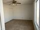 Bedroom with neutral carpeting and sliding door closet at 702 W Grove Cir, Mesa, AZ 85210