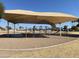 Covered playground with play structures at 702 W Grove Cir, Mesa, AZ 85210