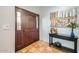 Bright entryway with tile flooring and wooden door at 7313 E Pleasant E Run, Scottsdale, AZ 85258