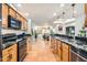 Well-lit kitchen with granite countertops and wooden cabinets at 7313 E Pleasant E Run, Scottsdale, AZ 85258