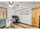 Home office with wood flooring and ceiling fan at 7313 E Pleasant E Run, Scottsdale, AZ 85258