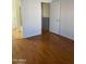 Bright bedroom with wood floors and bathroom access at 7801 N 44Th Dr # 1183, Glendale, AZ 85301