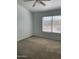 Bright bedroom featuring a ceiling fan and carpeted floors at 7801 N 44Th Dr # 1183, Glendale, AZ 85301