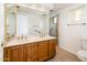 Bathroom with double sinks, shower, and tile flooring at 8300 E Via De Ventura Rd # 2006, Scottsdale, AZ 85258