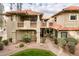 Spanish-style condo building with attractive landscaping and private balconies at 8300 E Via De Ventura Rd # 2006, Scottsdale, AZ 85258