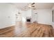 Bright living room featuring a fireplace and wood-look floors at 8300 E Via De Ventura Rd # 2006, Scottsdale, AZ 85258