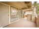 Covered patio with large windows and sunburst door at 8300 E Via De Ventura Rd # 2006, Scottsdale, AZ 85258