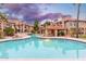 Community pool with a relaxing gazebo and seating at 8300 E Via De Ventura Rd # 2006, Scottsdale, AZ 85258