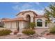 Two-story home with tile roof, two-car garage, and desert landscaping at 9144 E Pershing Ave, Scottsdale, AZ 85260