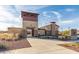 Community center entrance with a tower and landscaping at 9184 W Donald Dr, Peoria, AZ 85383