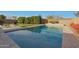 Inviting rectangular pool with surrounding landscaping at 9184 W Donald Dr, Peoria, AZ 85383