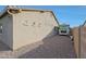 Gravel side yard with RV parking and exterior wall at 9184 W Donald Dr, Peoria, AZ 85383