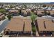 Neighborhood aerial view showing tile roofs, mature trees, and well-maintained landscaping at 9288 E Camino Del Santo --, Scottsdale, AZ 85260