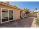 Charming backyard featuring a brick patio, perfect for outdoor entertaining at 9288 E Camino Del Santo --, Scottsdale, AZ 85260