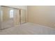 Bedroom with mirrored closet doors and built in storage at 9288 E Camino Del Santo --, Scottsdale, AZ 85260