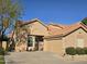 Charming single-story home featuring a desert-landscaped yard, a tile roof, and an attached two-car garage at 9288 E Camino Del Santo --, Scottsdale, AZ 85260