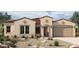 One-story home with Spanish-style architecture, featuring a terracotta roof and desert landscaping at 1032 W J Waltz Way, Apache Junction, AZ 85120