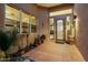 Elegant entryway with a wrought-iron door and tile flooring at 10874 E Dale Ln, Scottsdale, AZ 85262