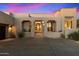 Elegant home exterior with a welcoming entryway at 10874 E Dale Ln, Scottsdale, AZ 85262