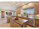 Kitchen with granite countertops and wood cabinets at 10874 E Dale Ln, Scottsdale, AZ 85262