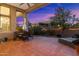 Peaceful patio featuring comfortable lounge chairs and a dining setting at 10874 E Dale Ln, Scottsdale, AZ 85262