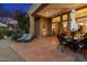 Outdoor patio space with comfortable seating and a dining area at 10874 E Dale Ln, Scottsdale, AZ 85262