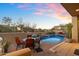 Spacious pool and patio area with sunset views at 10874 E Dale Ln, Scottsdale, AZ 85262