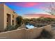 Backyard pool with a view of the neighborhood at 10874 E Dale Ln, Scottsdale, AZ 85262