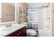 Bathroom with a shower/tub combo and a decorative shower curtain at 10951 N 91St Ave # 56, Peoria, AZ 85345