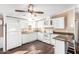 White kitchen with wood countertops and stainless steel appliances at 10951 N 91St Ave # 56, Peoria, AZ 85345