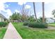 Landscaped community grounds with walking paths and mature trees at 13234 N 109Th Ave, Sun City, AZ 85351