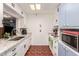 Modern kitchen with white cabinets, granite counters, and stainless steel appliances at 13234 N 109Th Ave, Sun City, AZ 85351