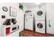 Convenient laundry area with a washer, dryer, and microwave at 13234 N 109Th Ave, Sun City, AZ 85351