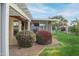 Relaxing backyard with covered patio and lush landscaping at 14131 W Circle Ridge Dr, Sun City West, AZ 85375