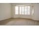 Bedroom with bay window and plantation shutters at 14131 W Circle Ridge Dr, Sun City West, AZ 85375