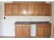 Garage workshop featuring wood cabinets and countertop at 14131 W Circle Ridge Dr, Sun City West, AZ 85375