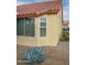 Light yellow house exterior with tile roof at 14131 W Circle Ridge Dr, Sun City West, AZ 85375