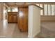 Kitchen island with granite countertop and wood cabinets at 14131 W Circle Ridge Dr, Sun City West, AZ 85375