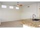 Kitchen features granite countertops and a breakfast bar at 14131 W Circle Ridge Dr, Sun City West, AZ 85375