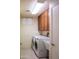 Laundry room with washer, dryer and storage cabinets at 14131 W Circle Ridge Dr, Sun City West, AZ 85375